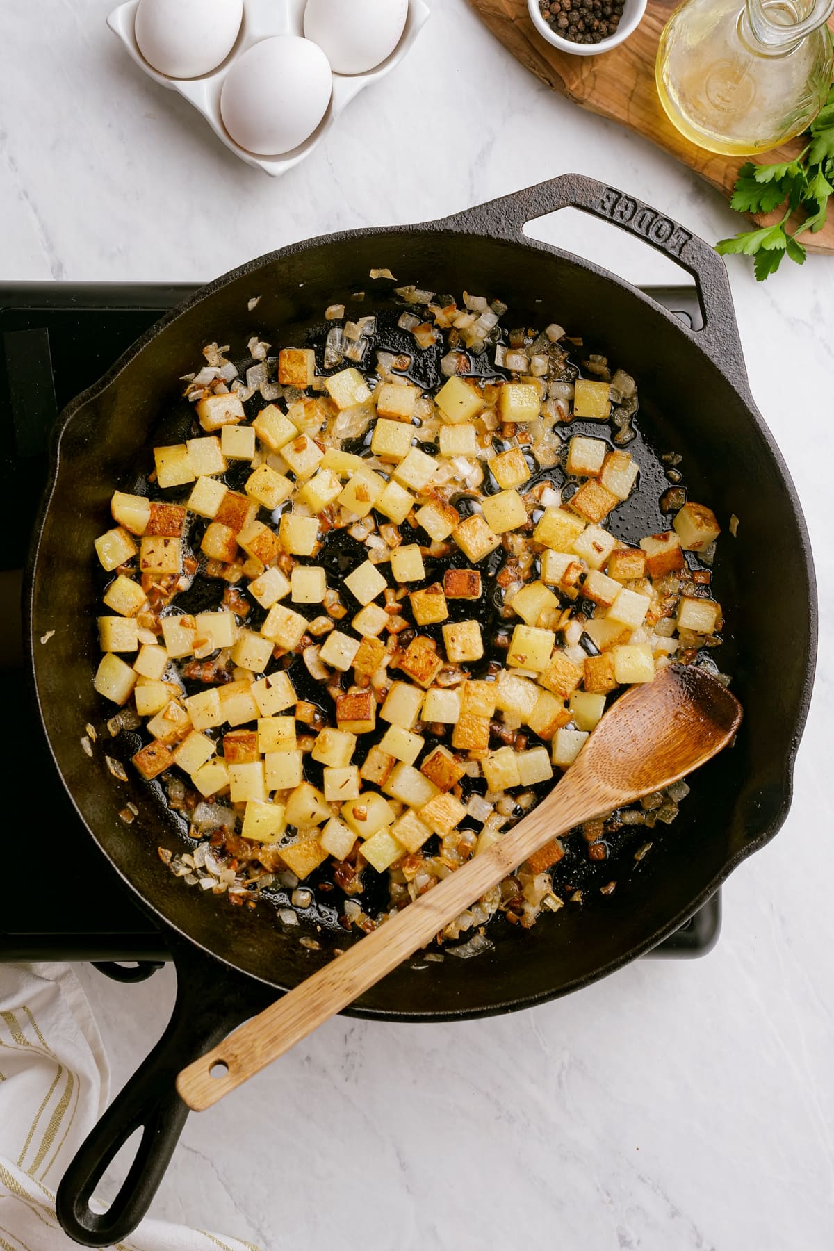 browning potatoes in a skillet
