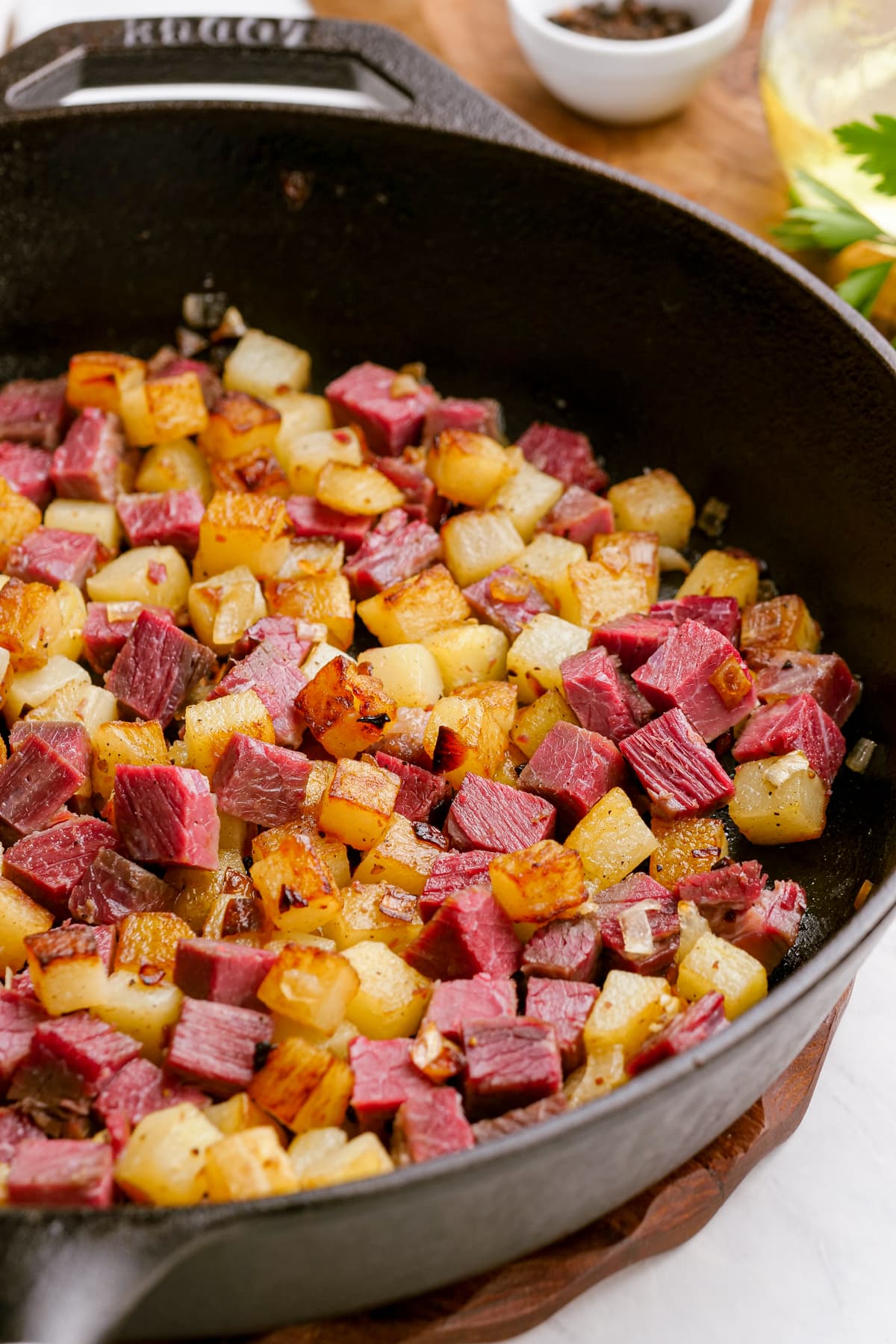 close up view of corned beef hash in pan