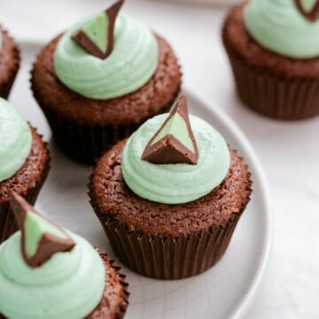 close up of mint brownie bites on a plate