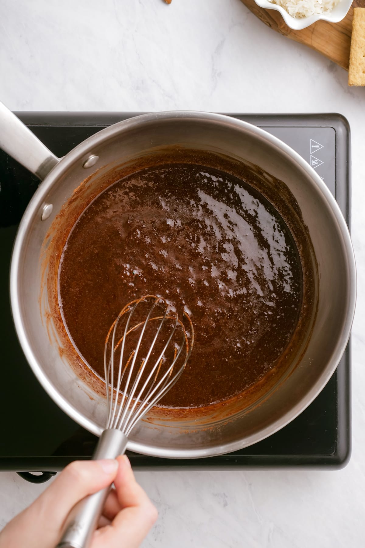 melted chocolate in a pan on the stove