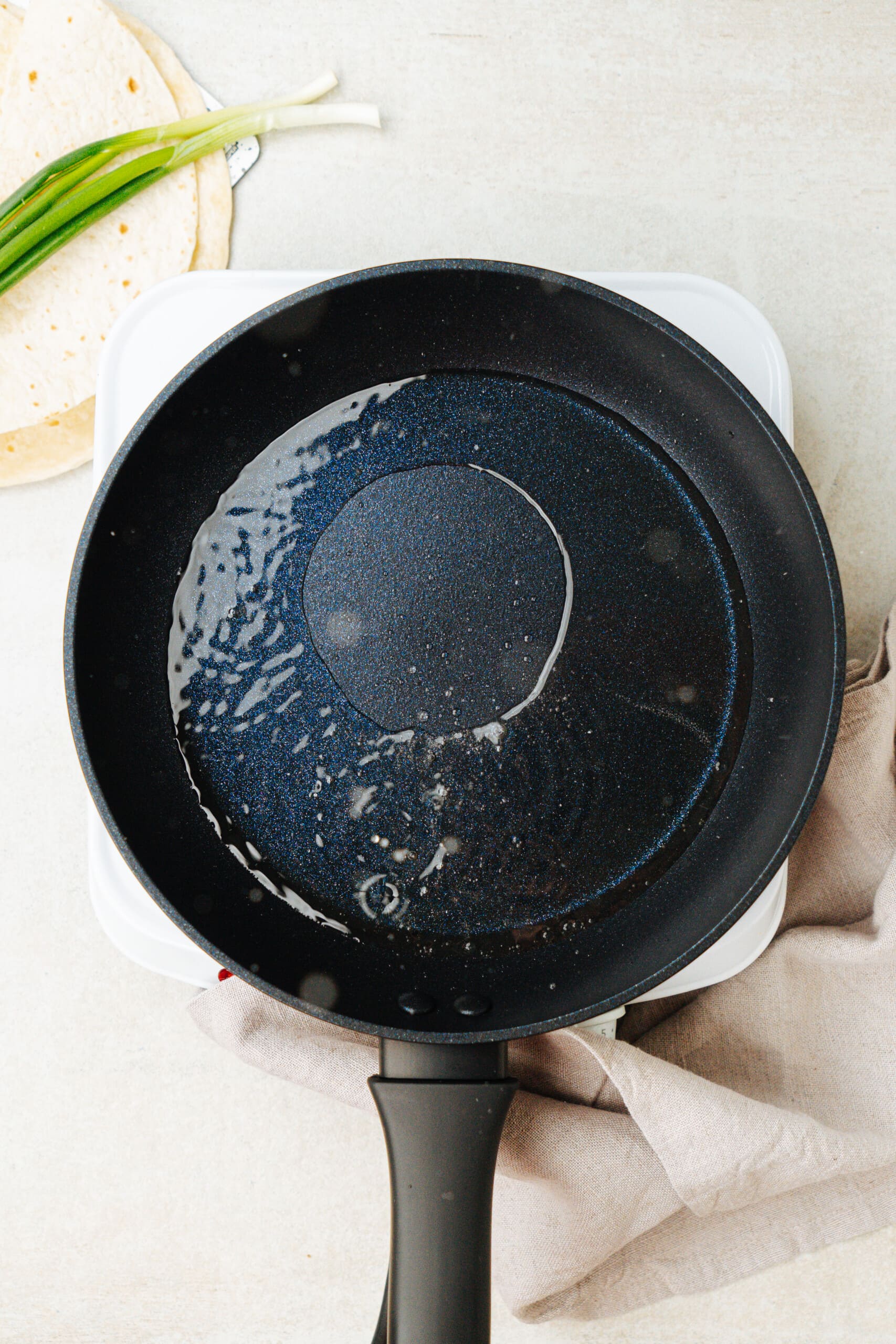 cast iron skillet with hot oil 