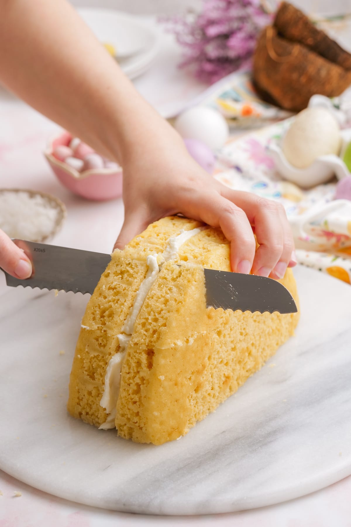 knife cutting cake
