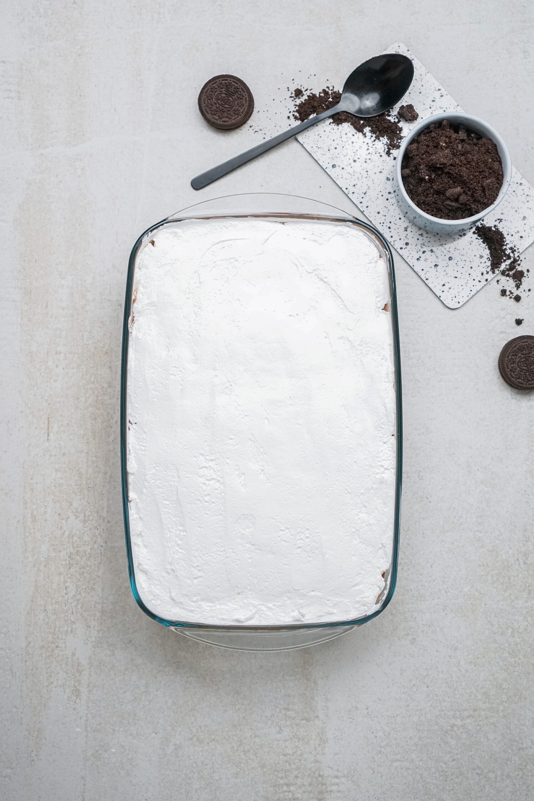 chocolate lasagna with top whipped cream layer on top