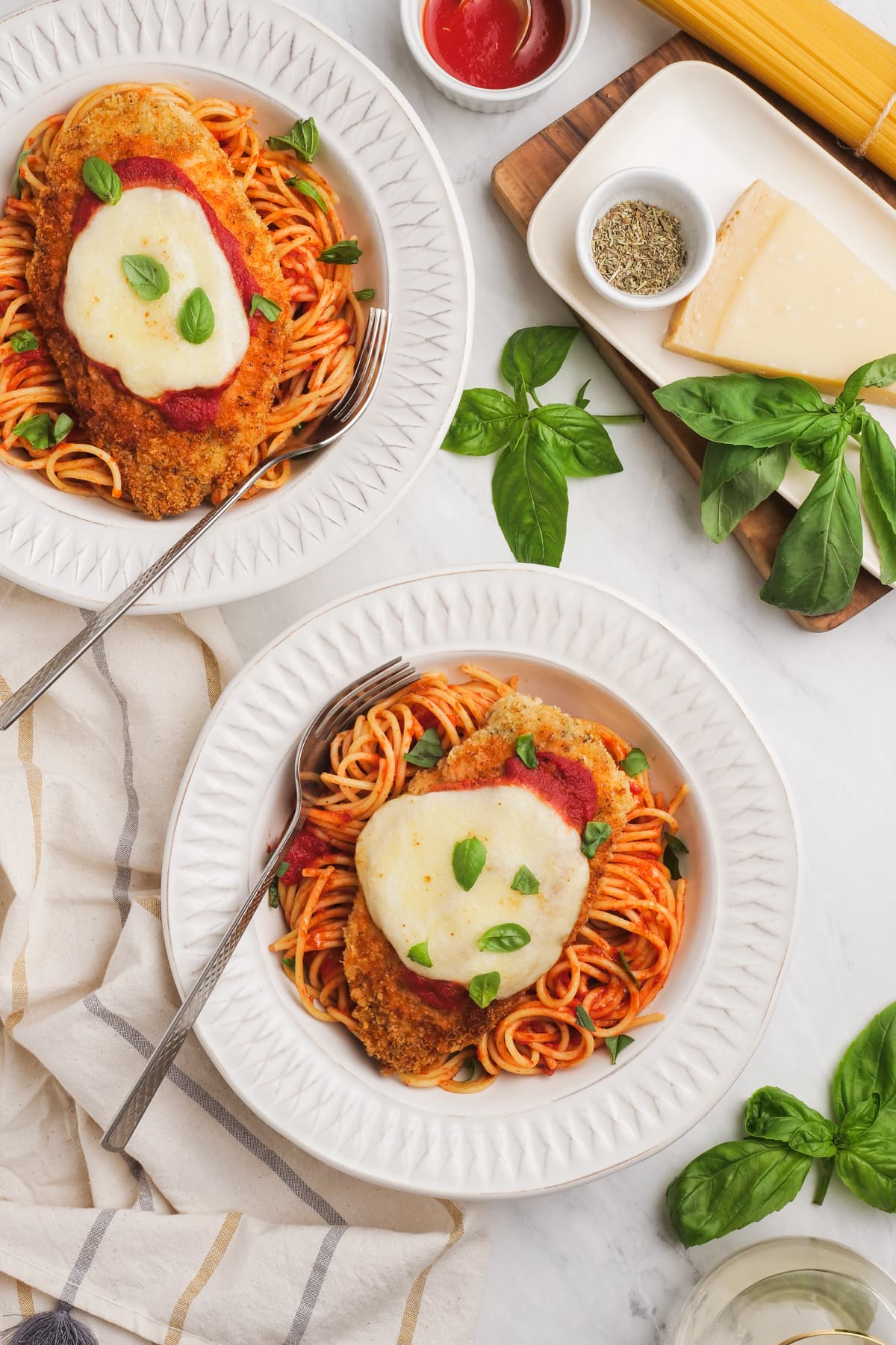 chicken parmesan plated and on a tablescape