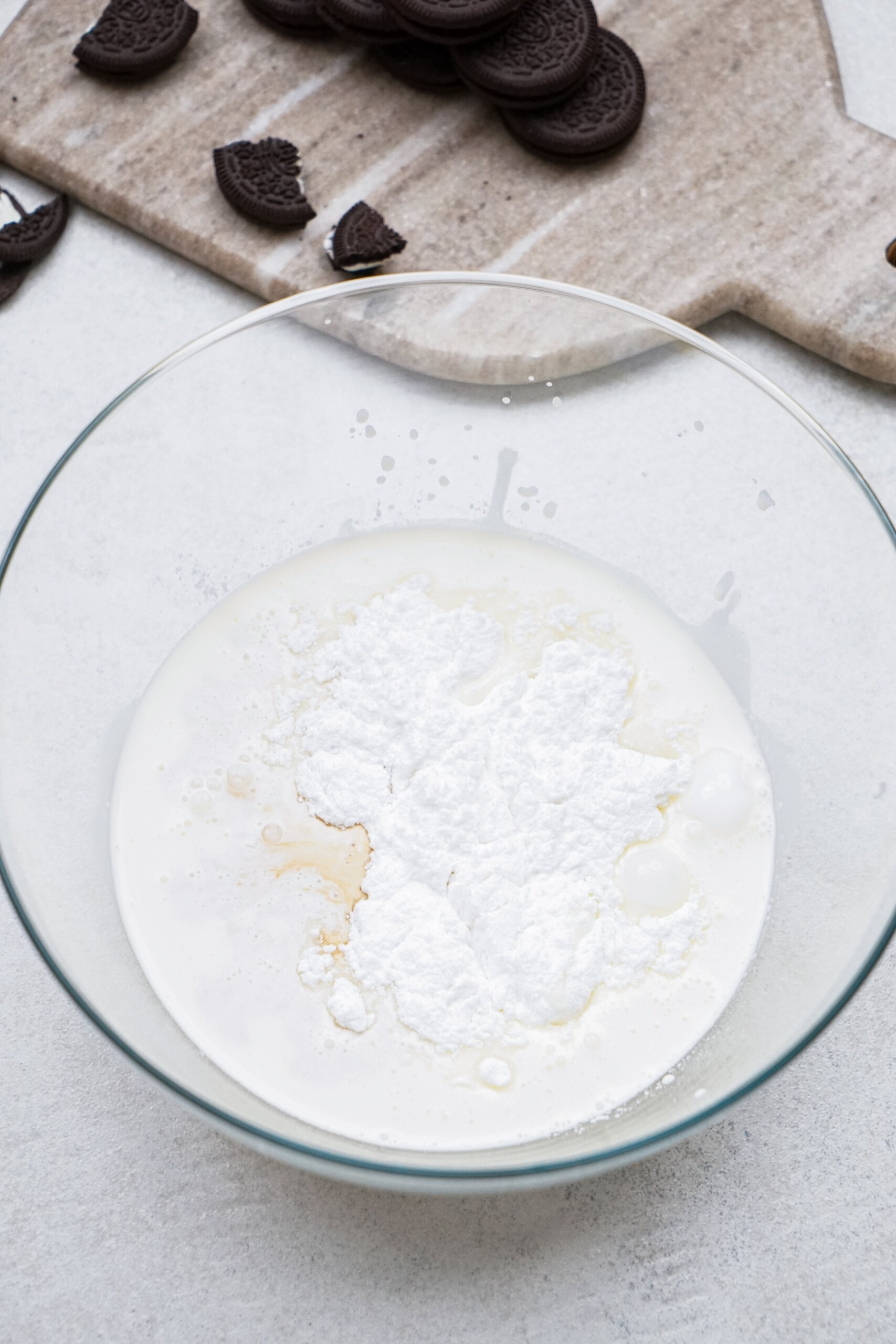 whipped cream ingredients in a bowl