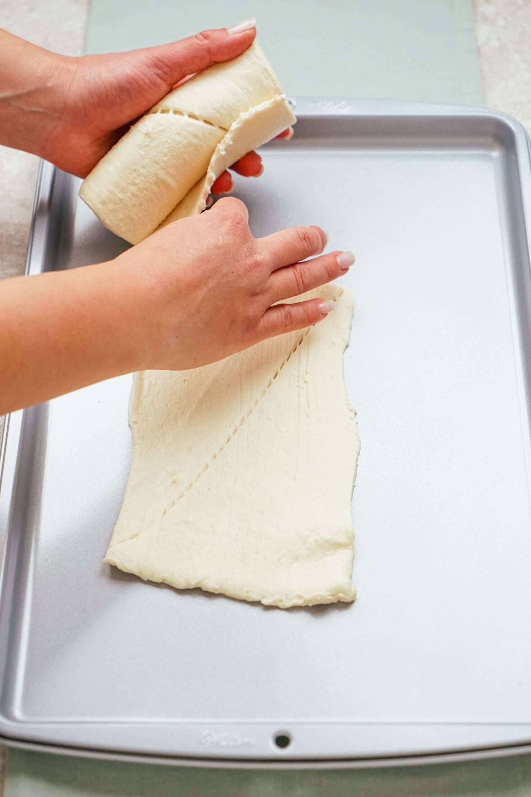 crescent dough on a baking sheet