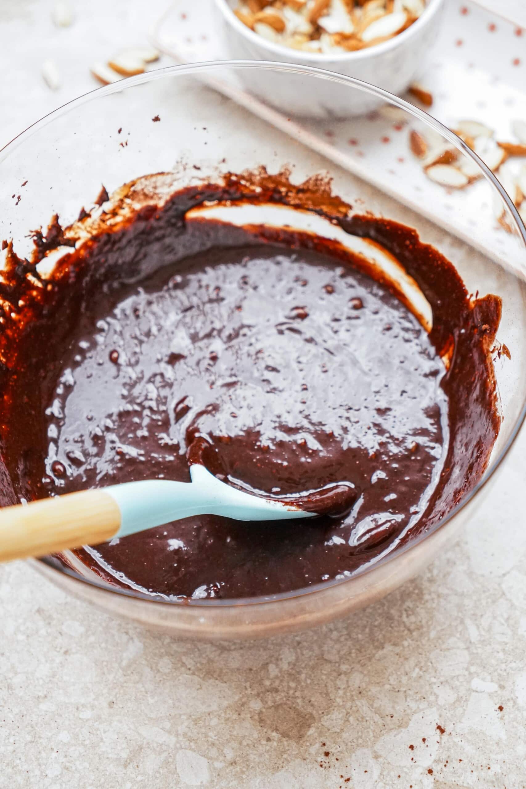 flourless chocolate cake batter with a rubber spatula