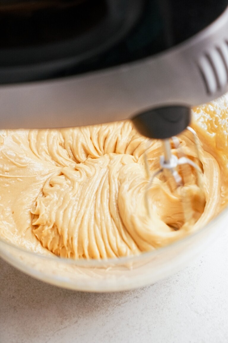 hand mixer whipping cream cheese mixture