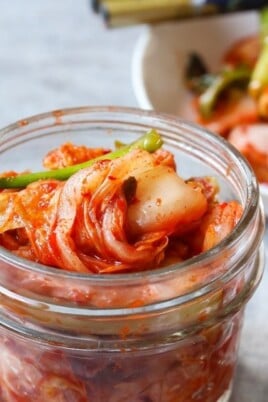 Kimchi in a jar and in a plate