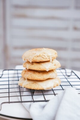 apple oatmeal cookies stack on a cooling rack