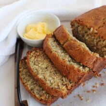 sliced banana bread with a dish of butter