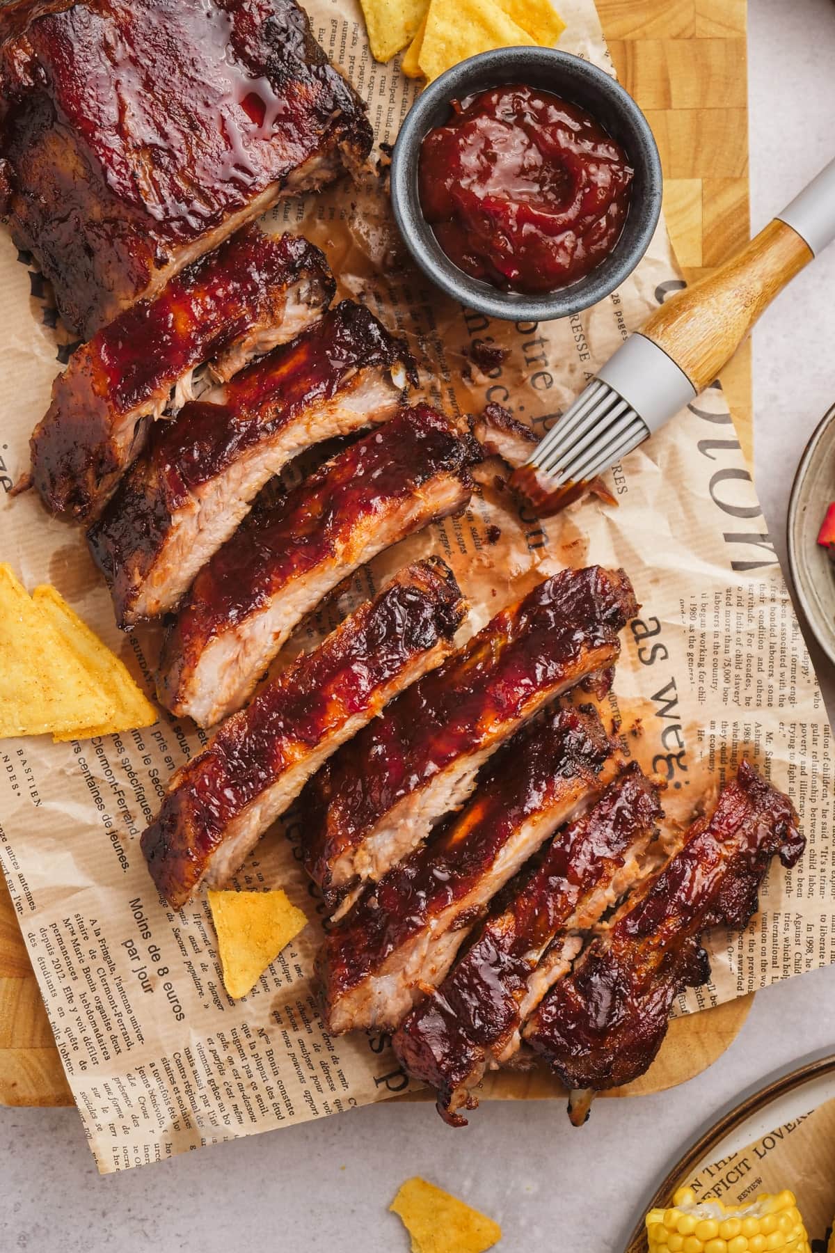oven baked ribs sliced on serving board
