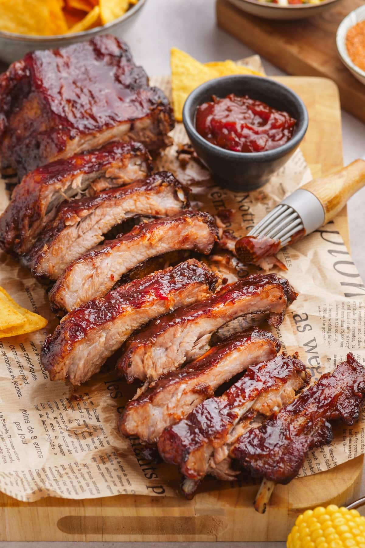 oven baked ribs sliced on serving board