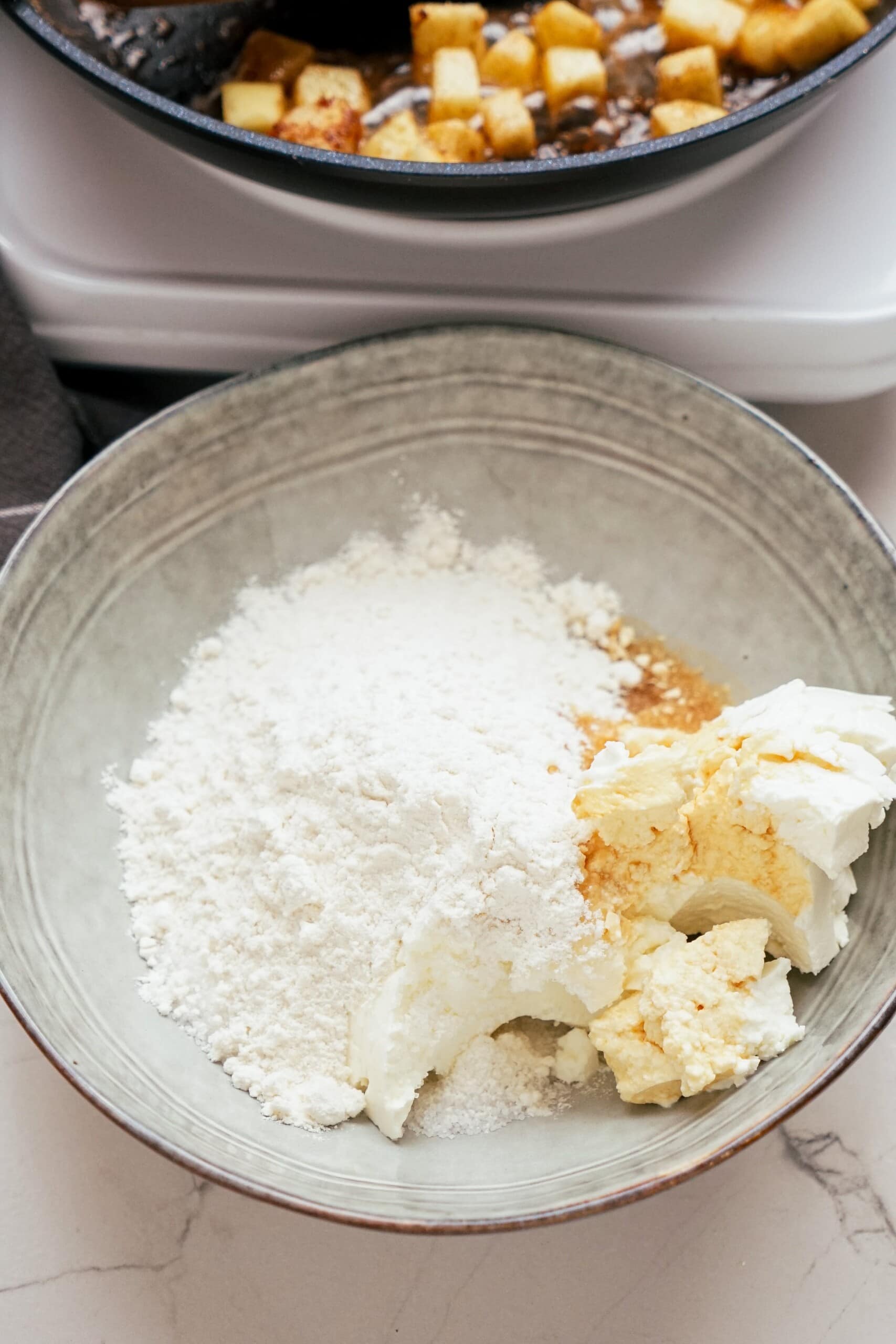 cream cheese filling ingredients in a bowl 