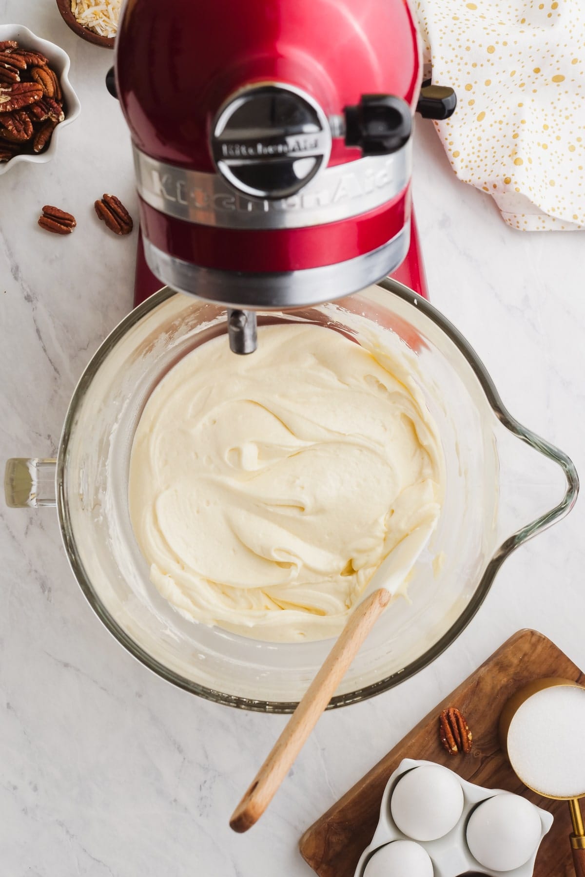 cream cheese frosting in a bowl of stand mixer