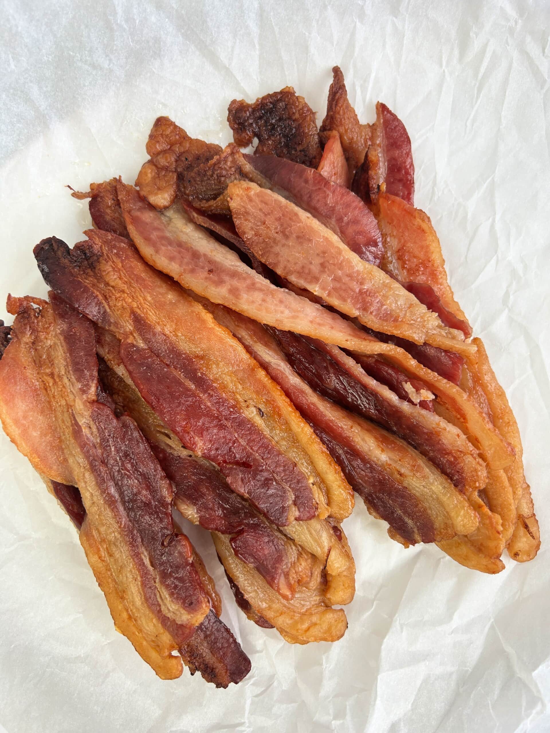 Pile of Bacon on parchment paper