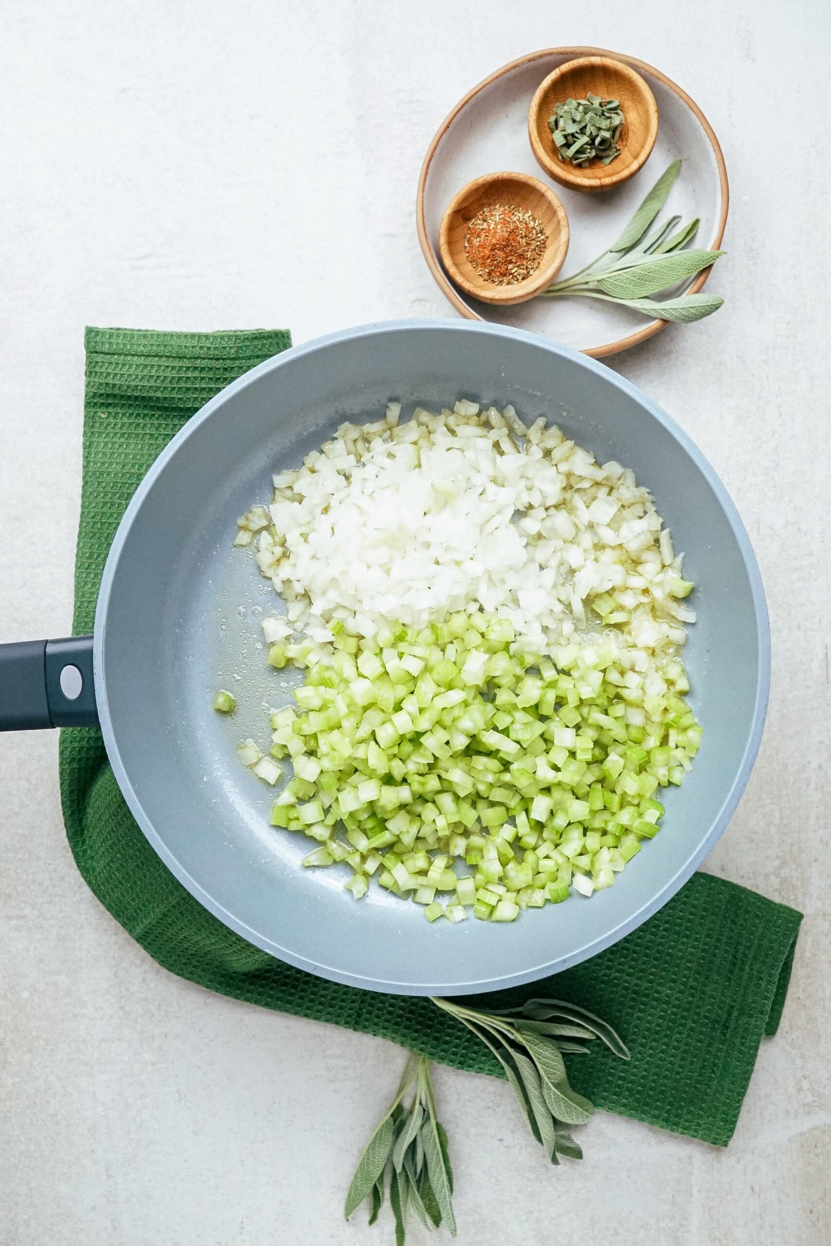 diced onions and celery  in a skillet