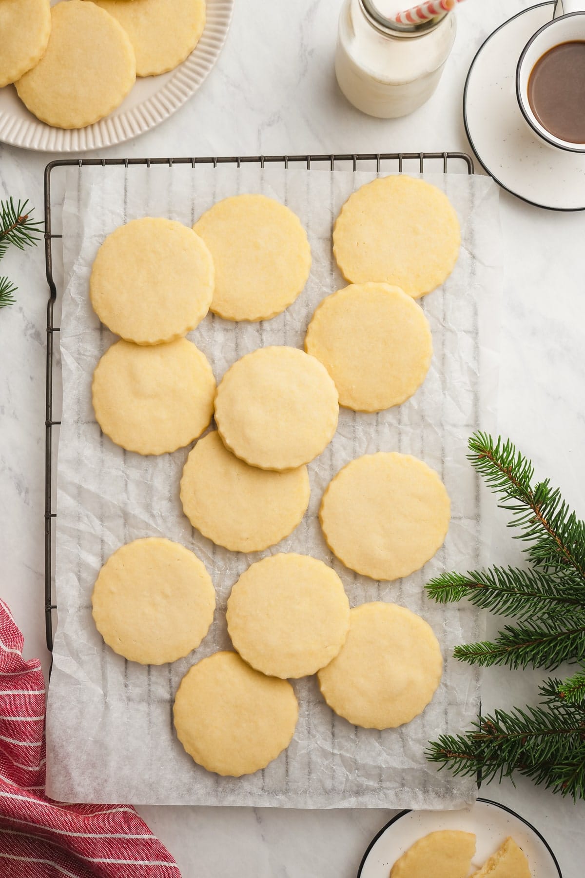 shortbread cookies on a wire rack and parchment paper