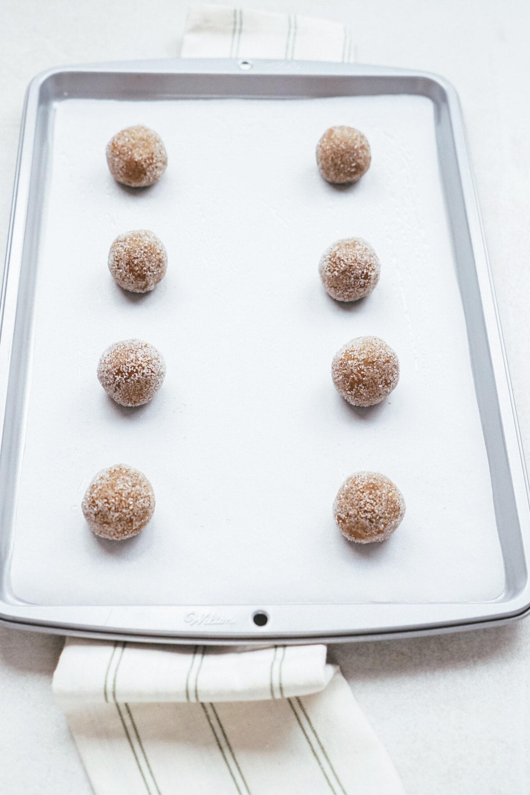 dough balls on a cookie sheet