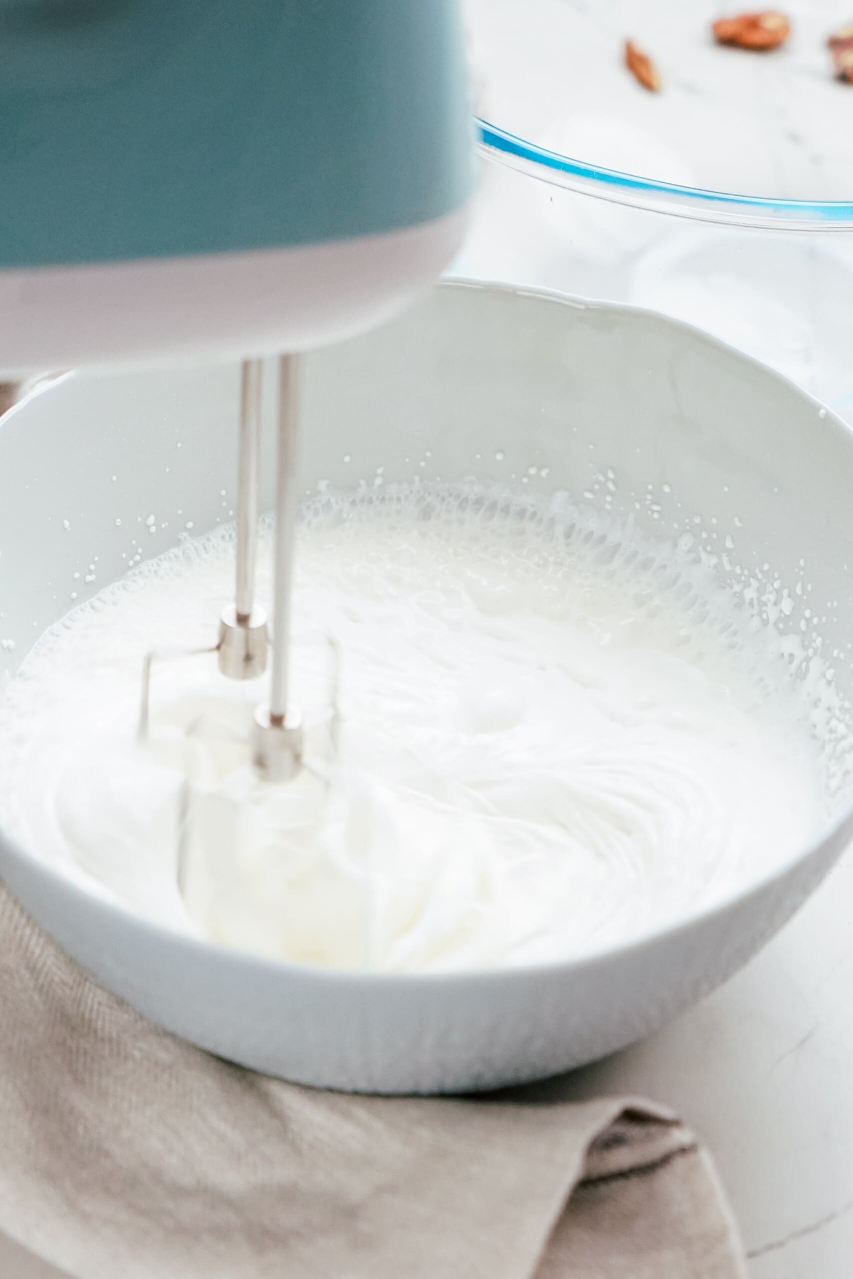 electric mixer whipping heavy cream