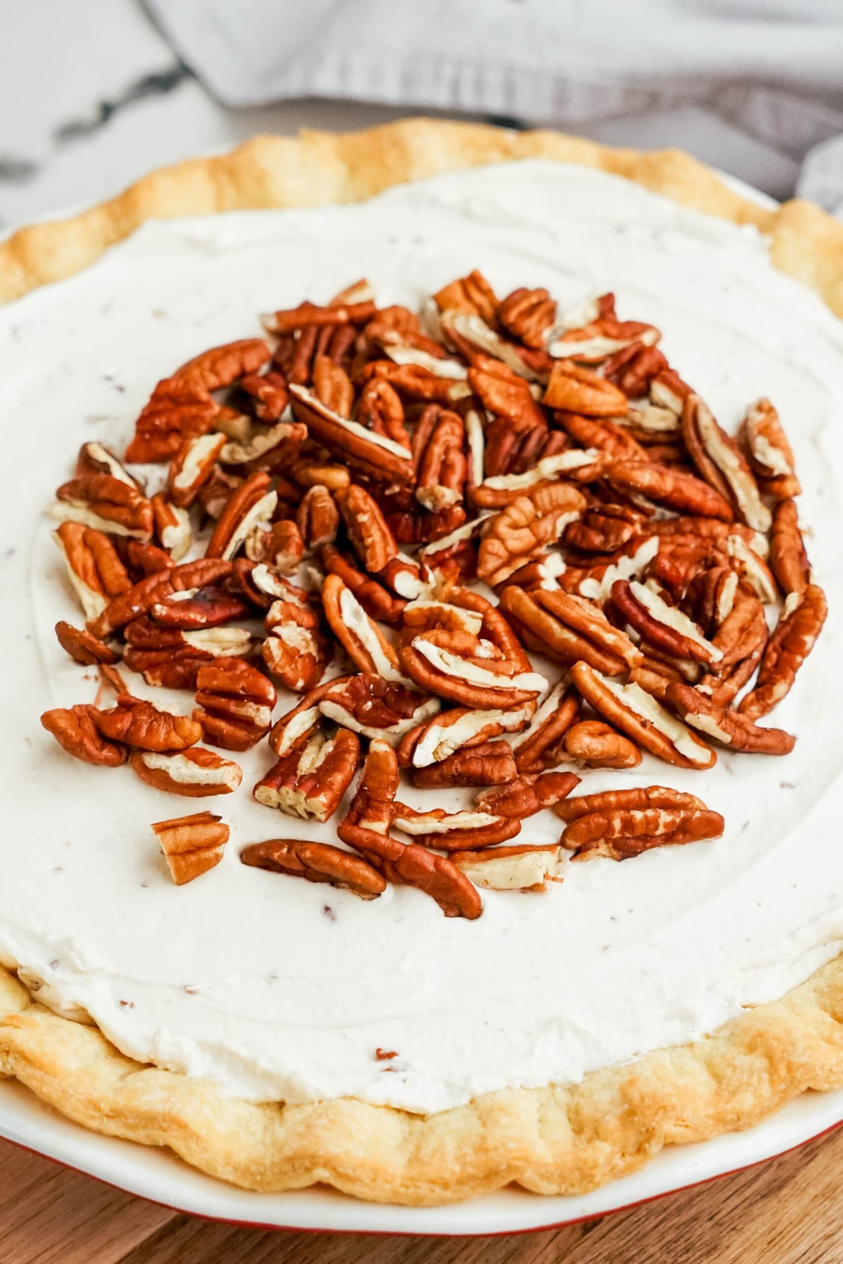 pecans added to top of pie 