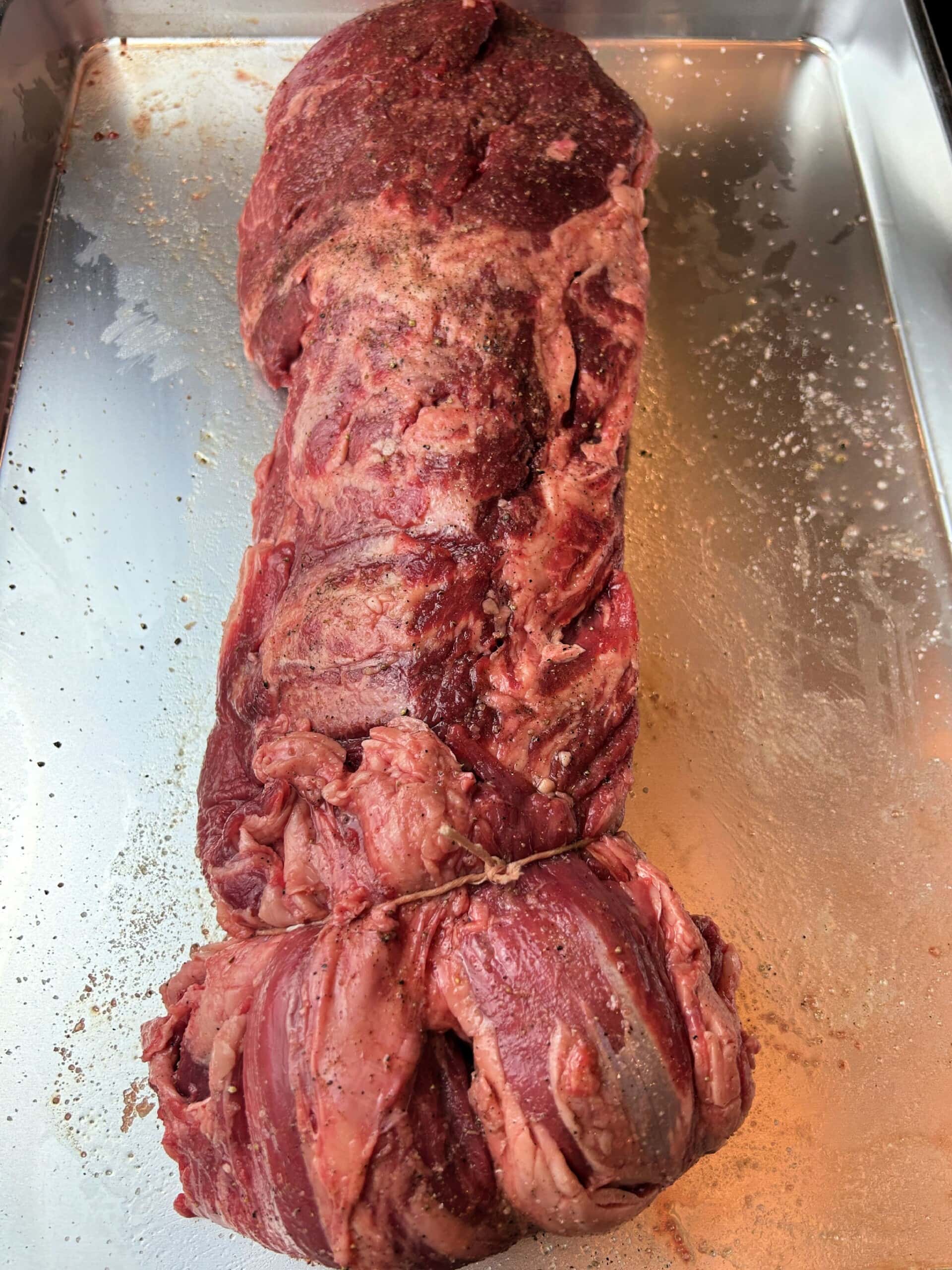 raw Smoked Beef Tenderloin on baking tray