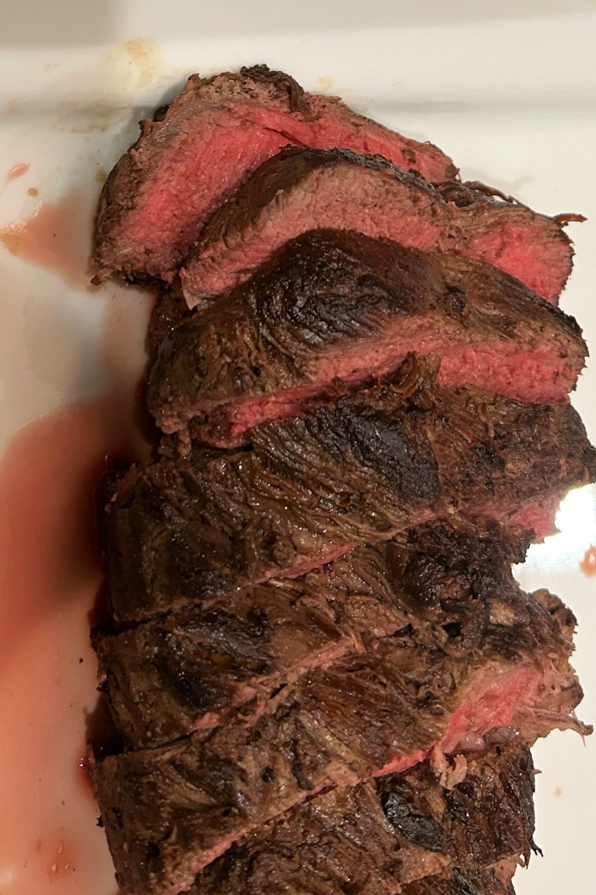 Smoked Beef Tenderloin sliced on platter