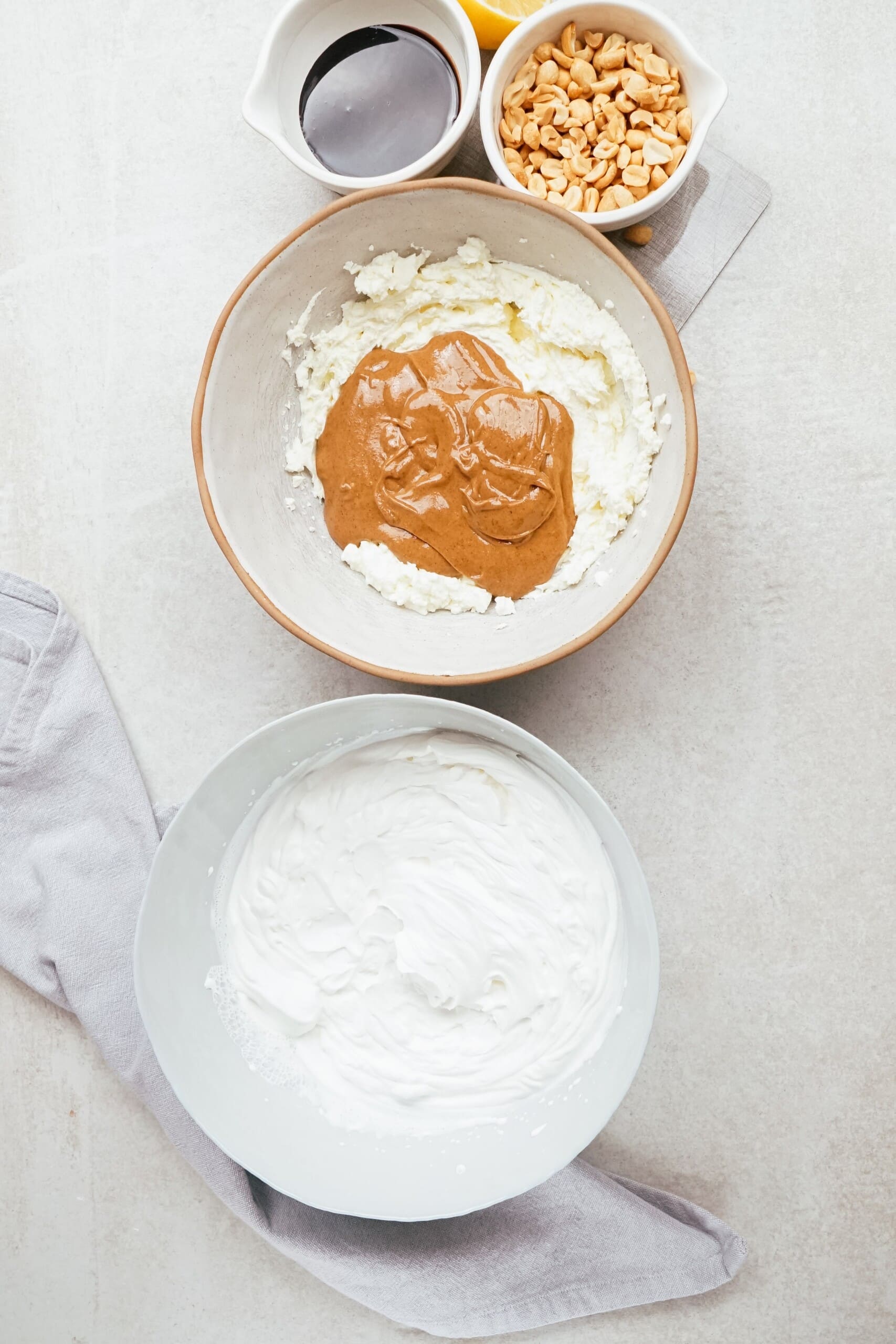 whipped cream in one bowl, cream cheese and pb in the other bowl
