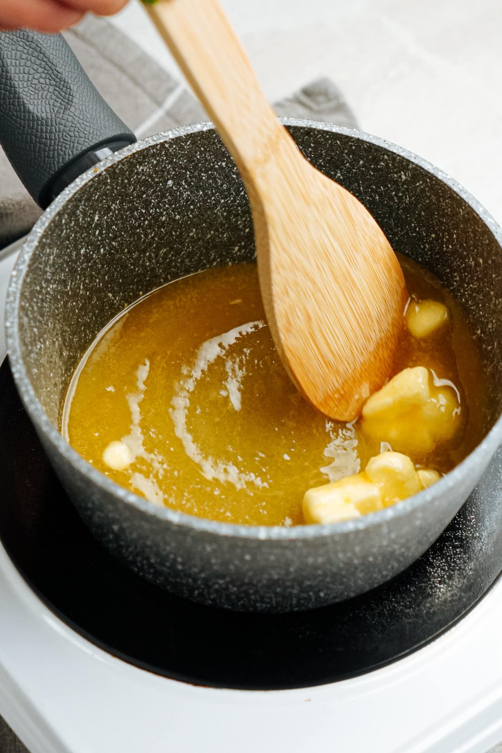 melting glaze ingredients in a saucepan