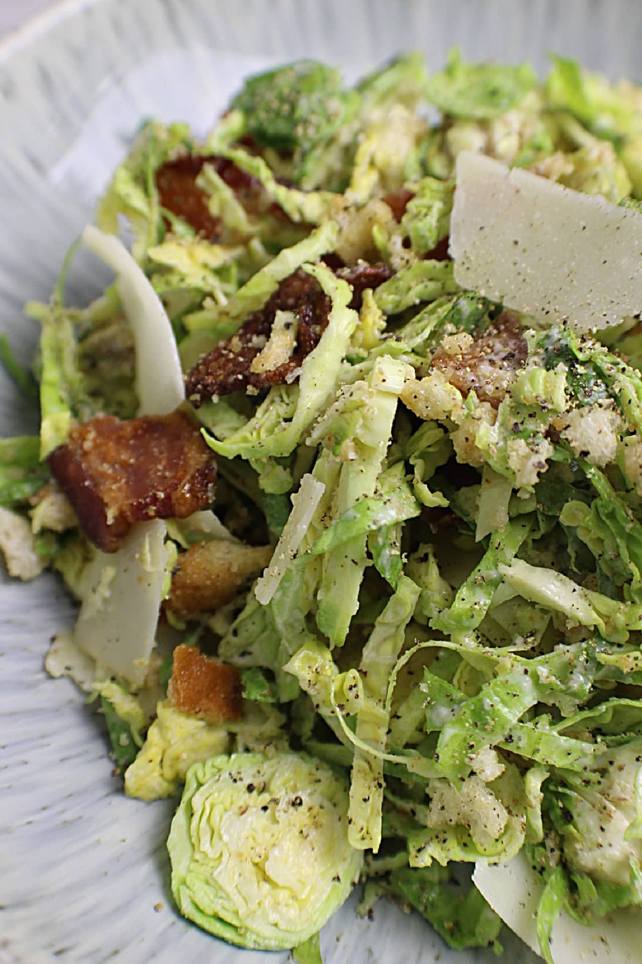 Brussels Sprouts Caesar Salad on salad plate