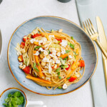 plated noodle salad on a tablescape