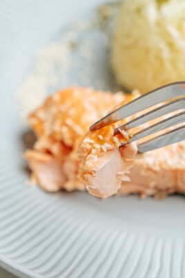 A fork is used to eat salmon.