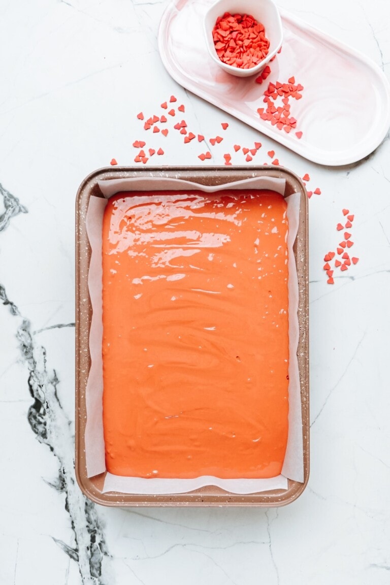 red velvet cake batter in a cake pan