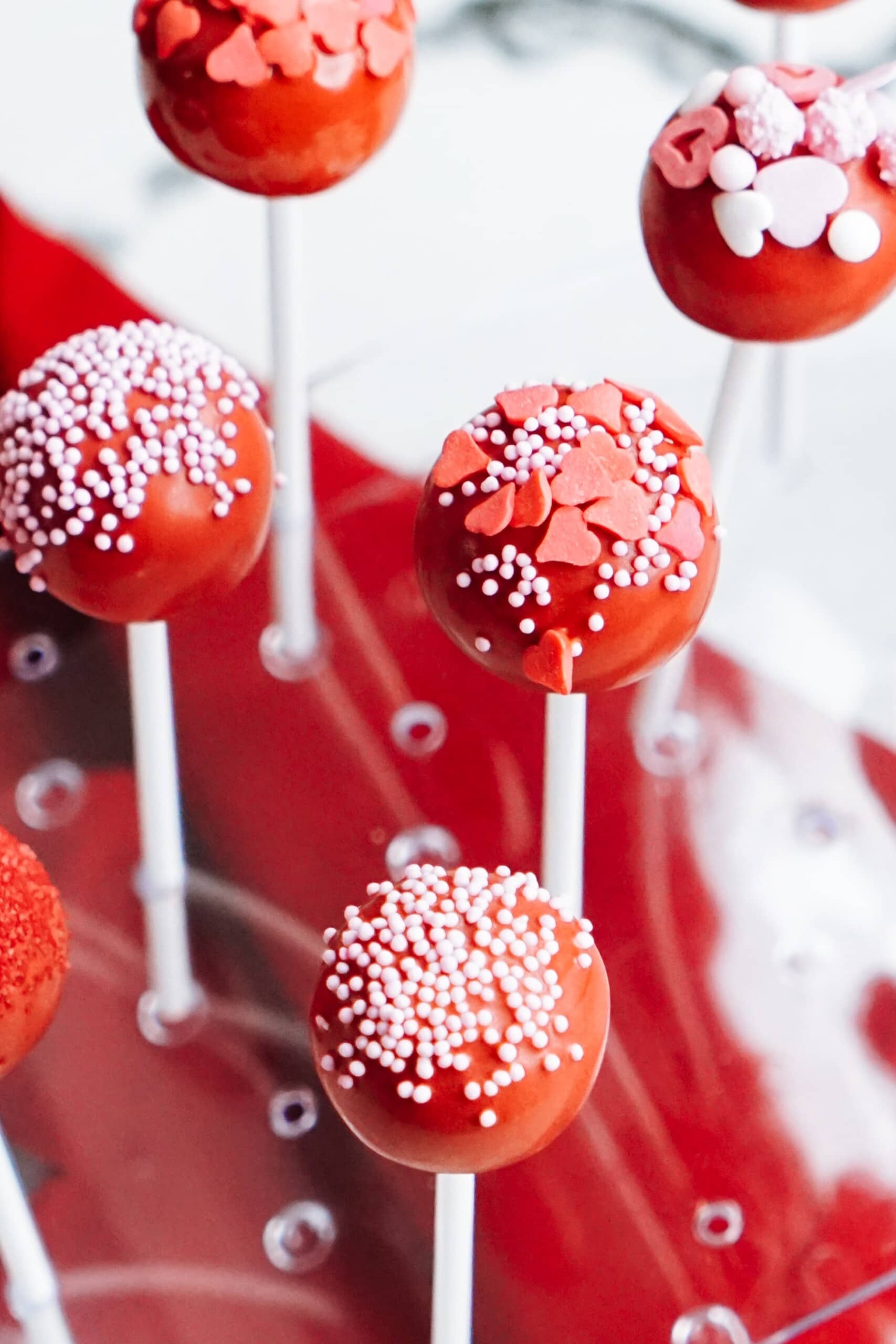 decorated cake pops in a cake pop stand