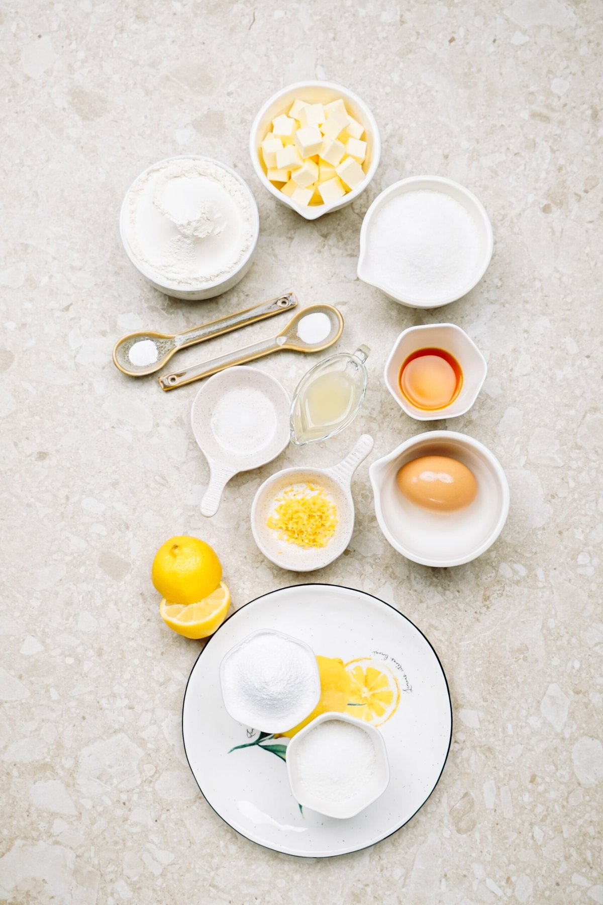 ingredients for lemon crinkle cookies on a counter