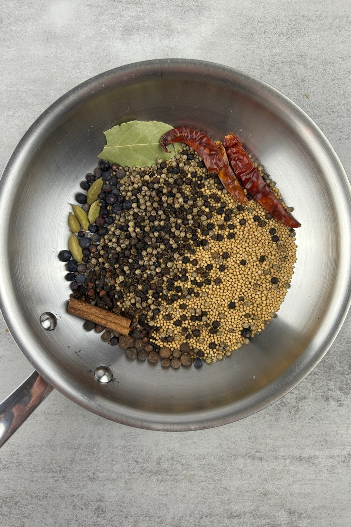 Spices in a frying pan for a corned beef recipe