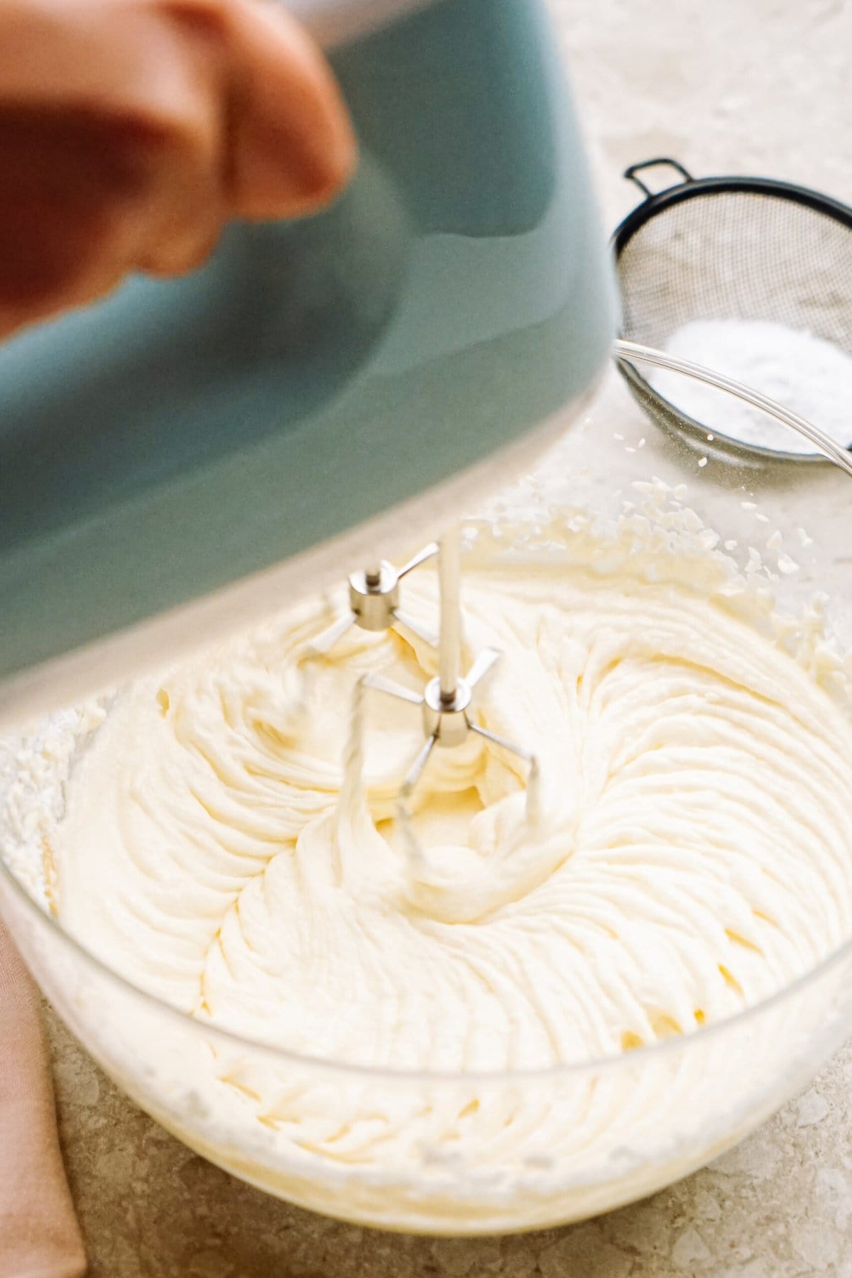 butter cream cheese frosting in a mixing bowl