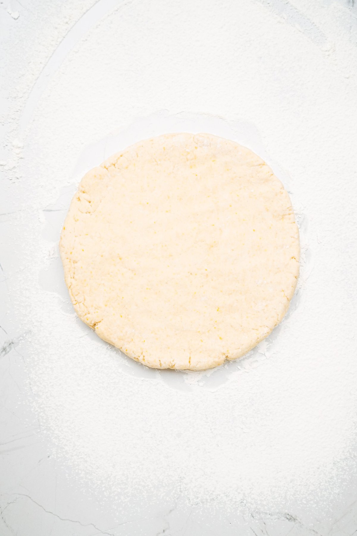 scone dough formed into a circle