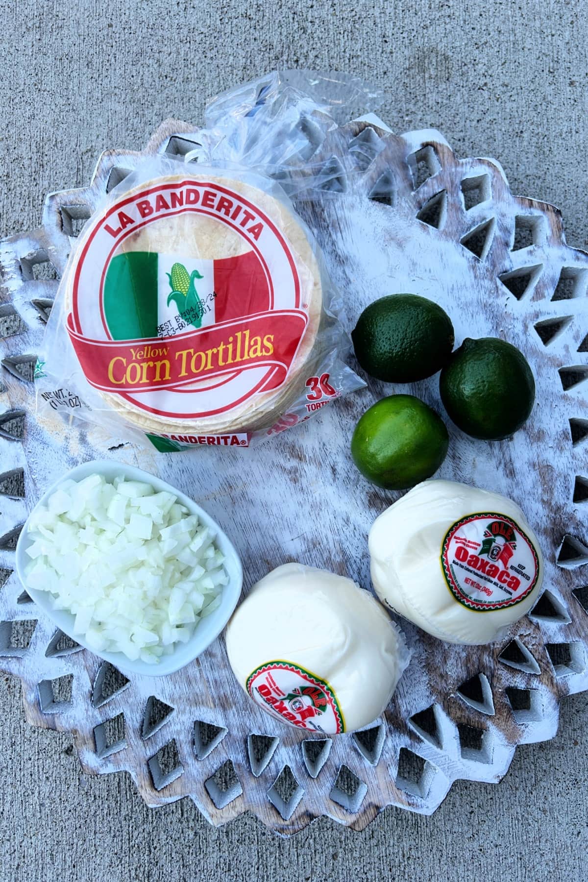 instant pot birria taco tortillas, limes and queso ingredients