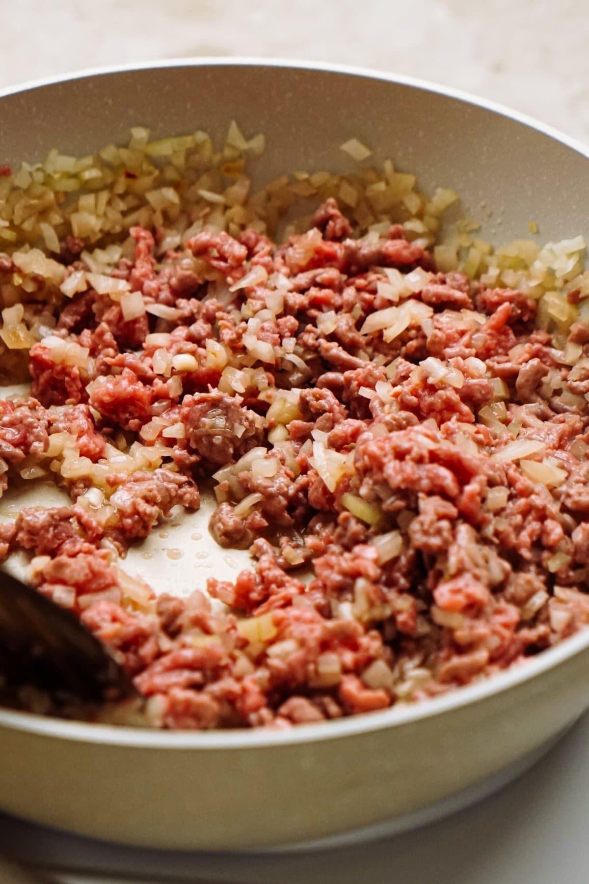 ground beef browning in a large skillet