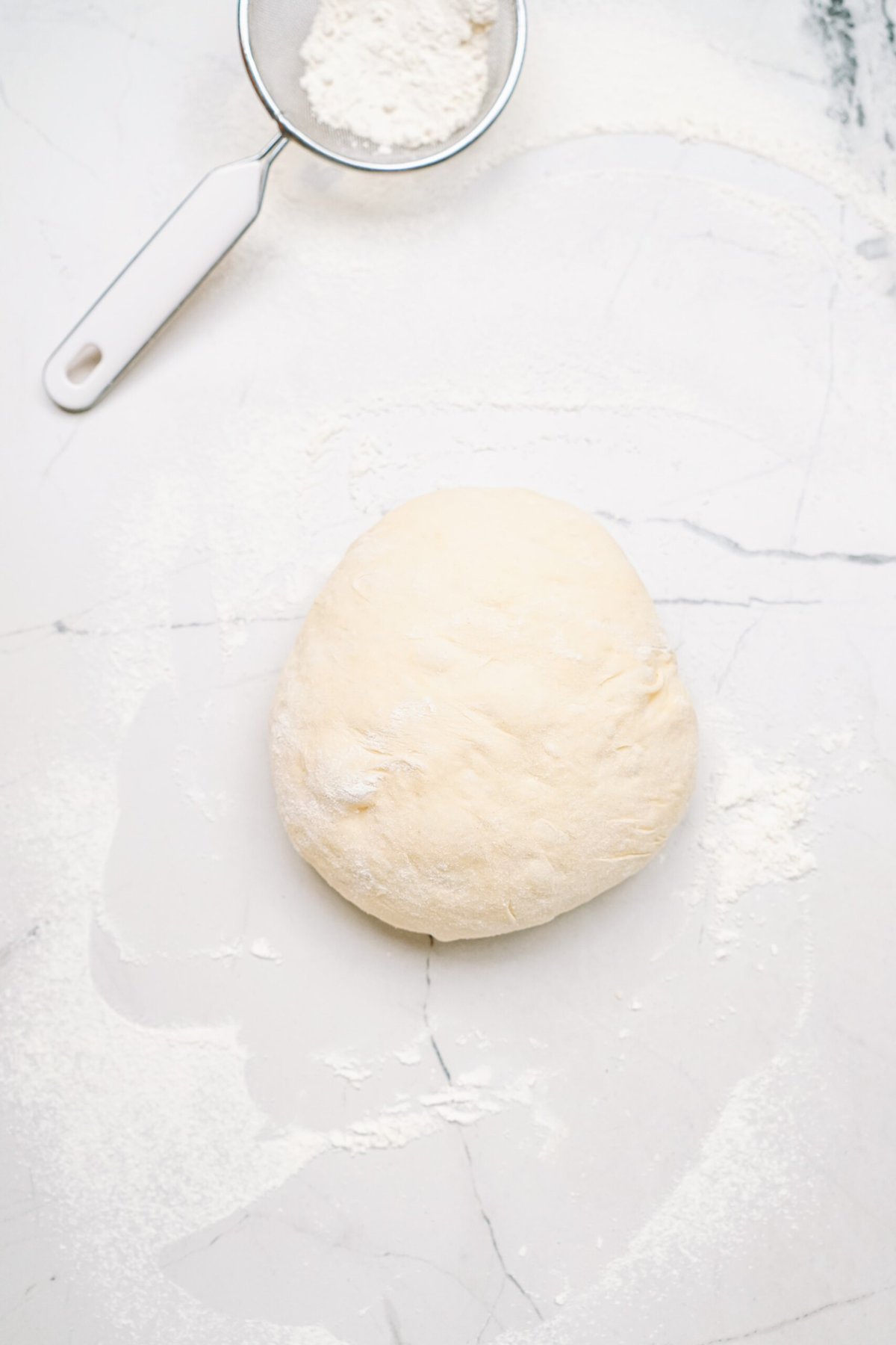 floured dough on a counter