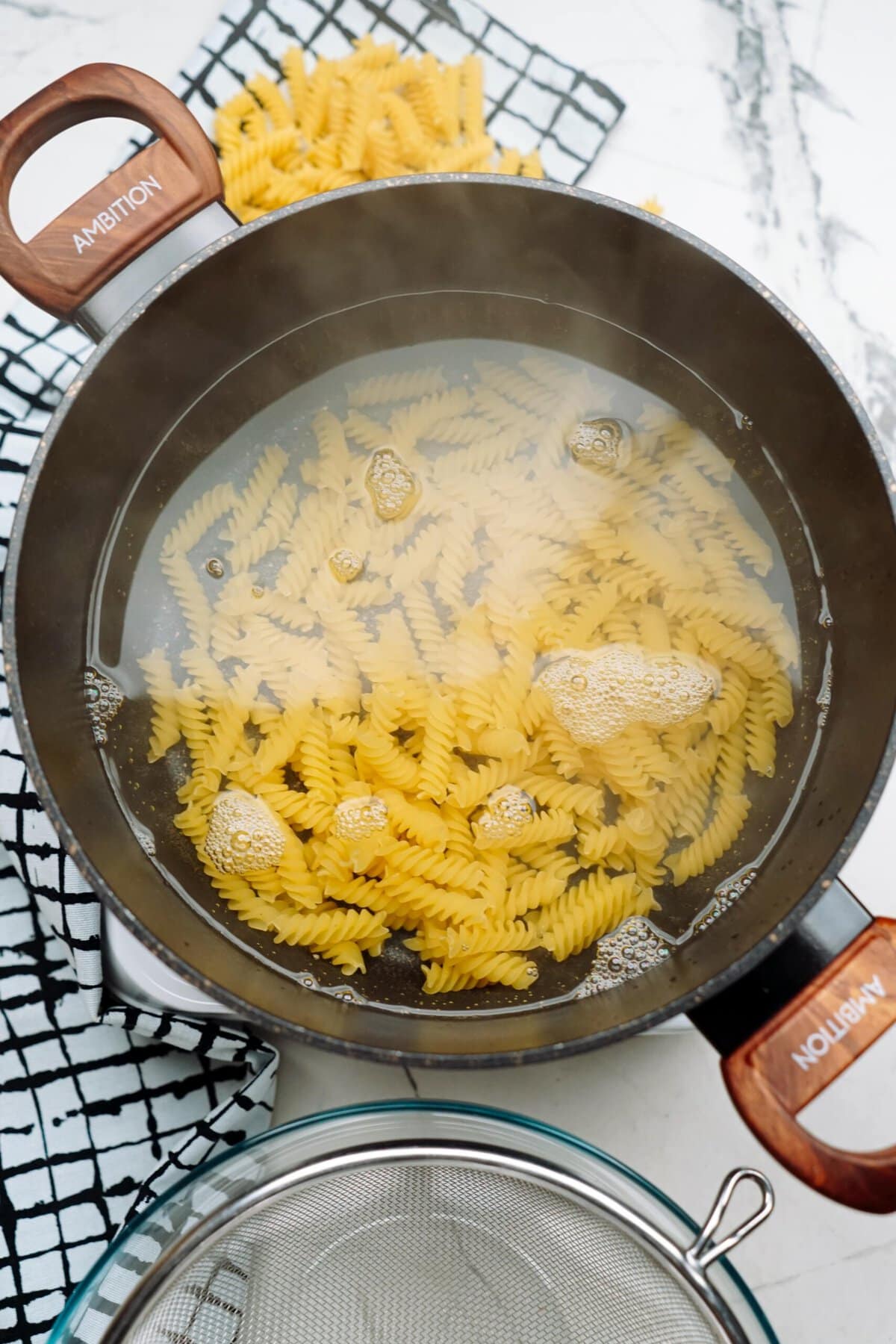 pasta cooking in a large pot 