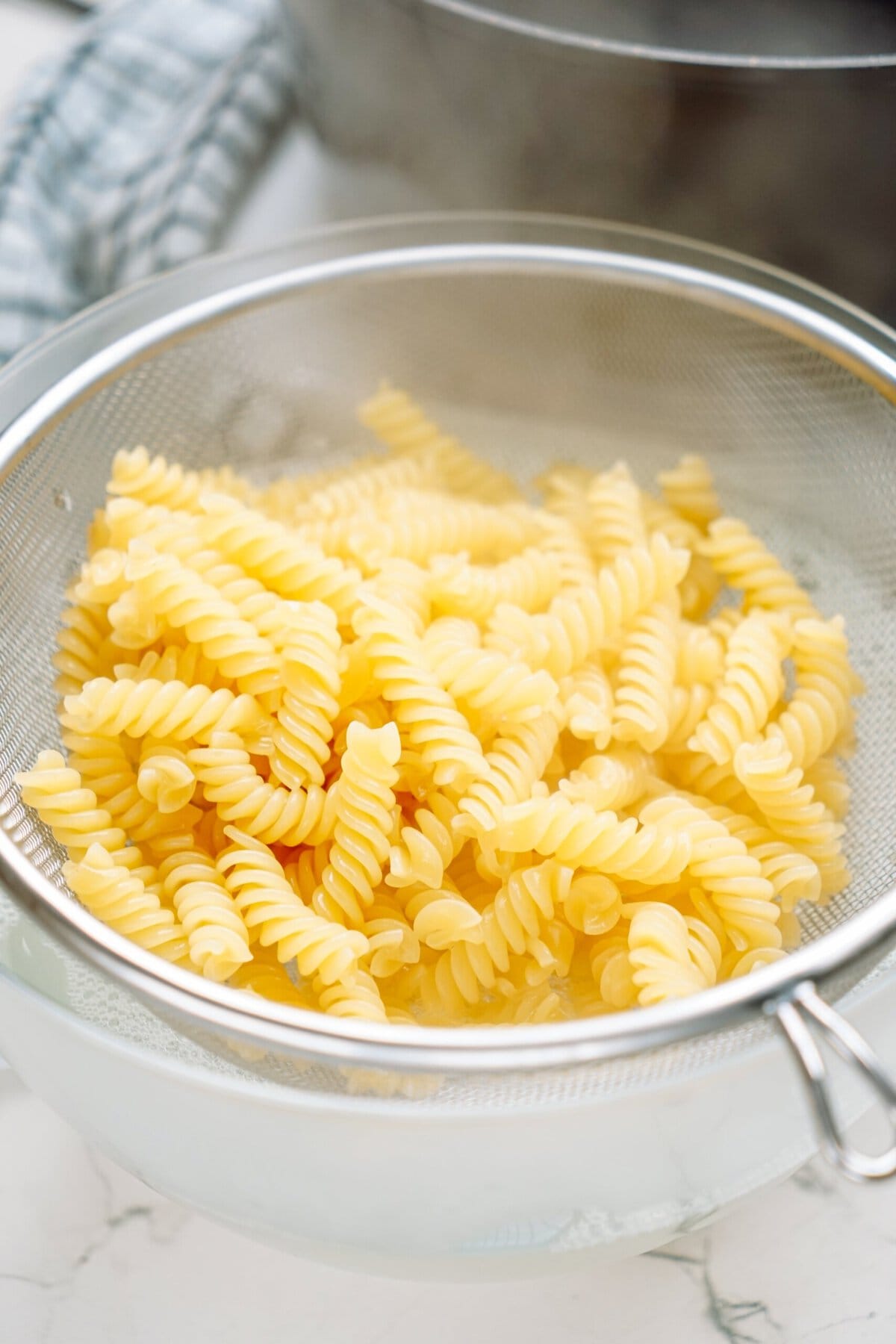 hot pasta in a colander 