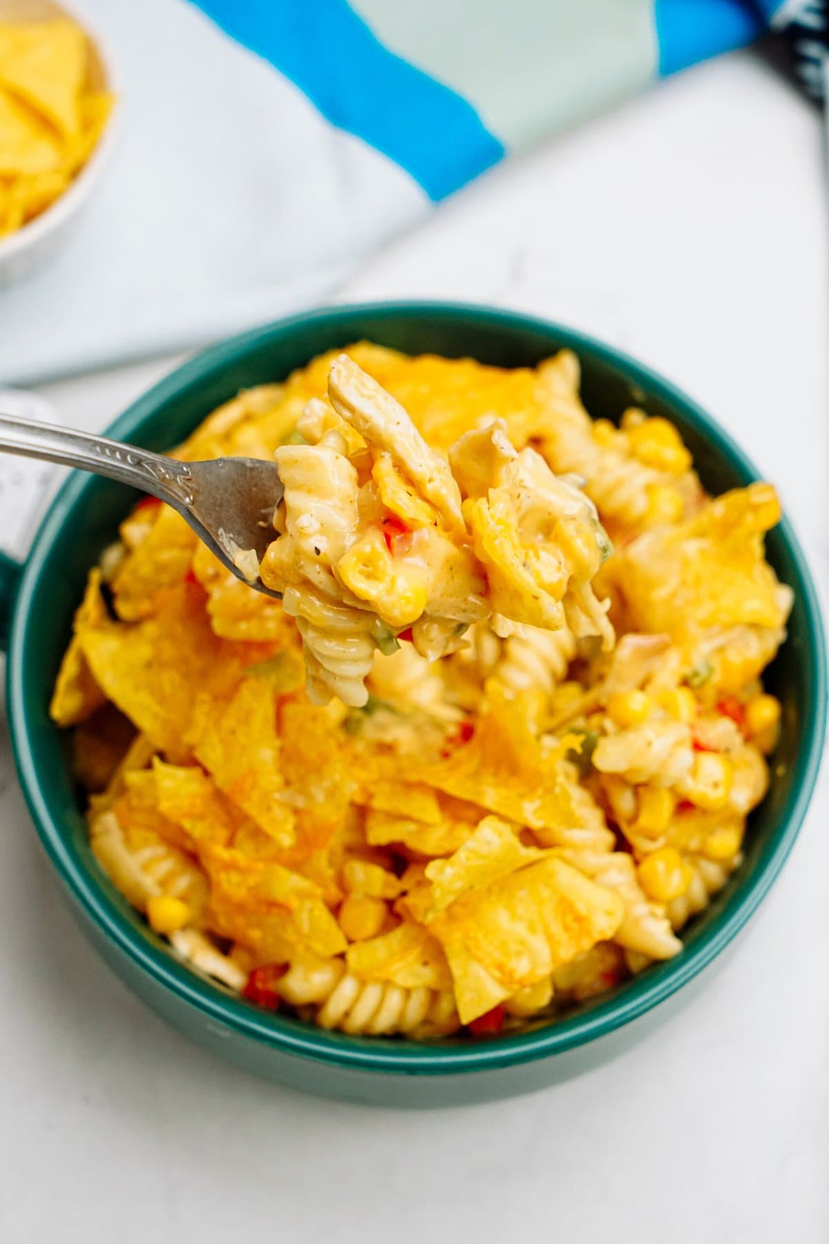 southwest chicken pasta in a bowl with a bite on a fork