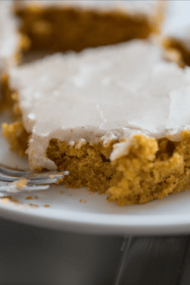 pumpkin bars on plate with fork, bite taken out