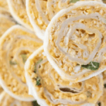 Buffalo Chicken Tortilla Roll Ups. Photo credit Practically Homemade.