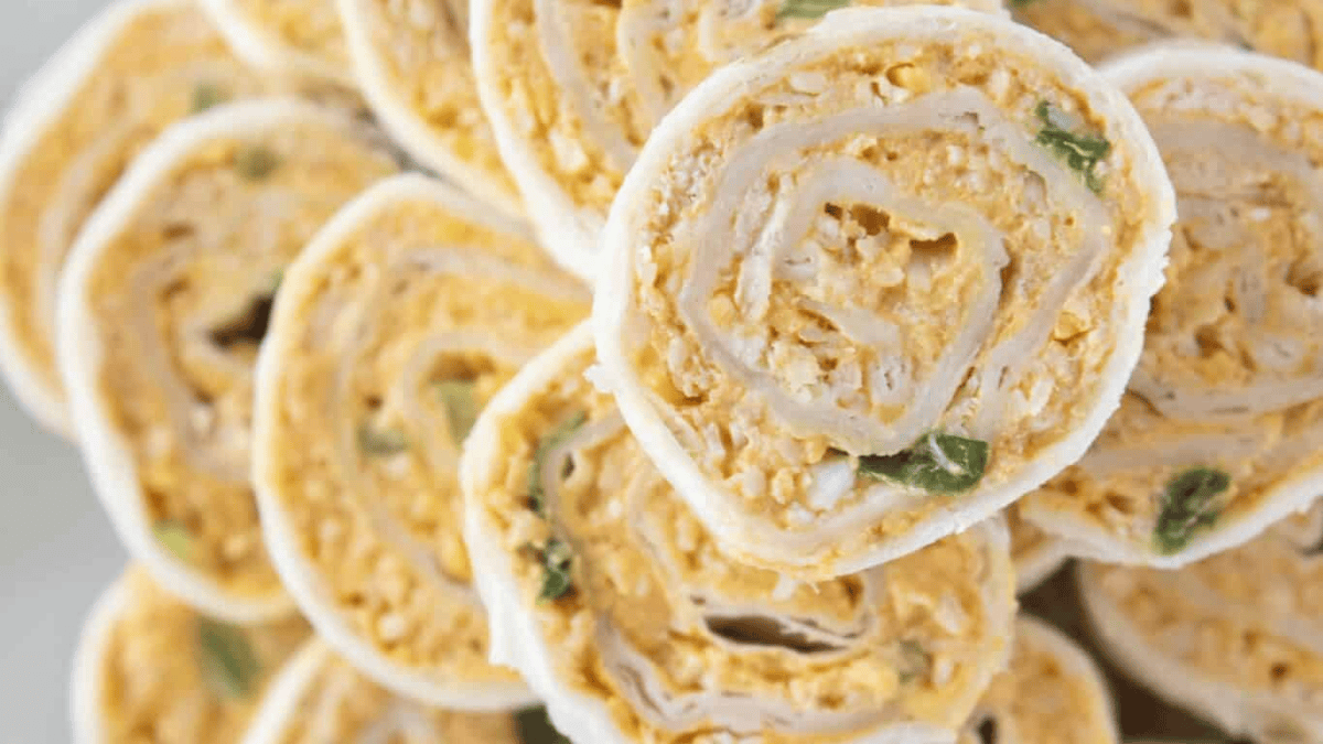 Buffalo Chicken Tortilla Roll Ups. Photo credit Practically Homemade.