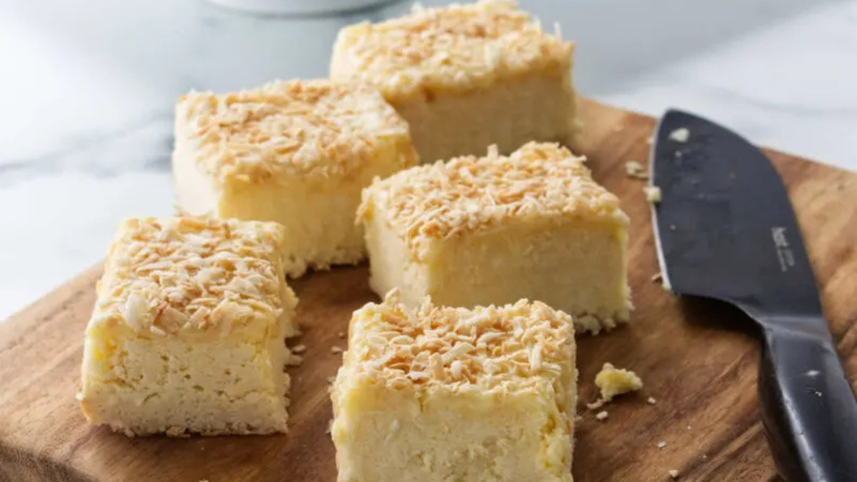 Coconut Cheesecake Bars. Photo credit Savor The Best.