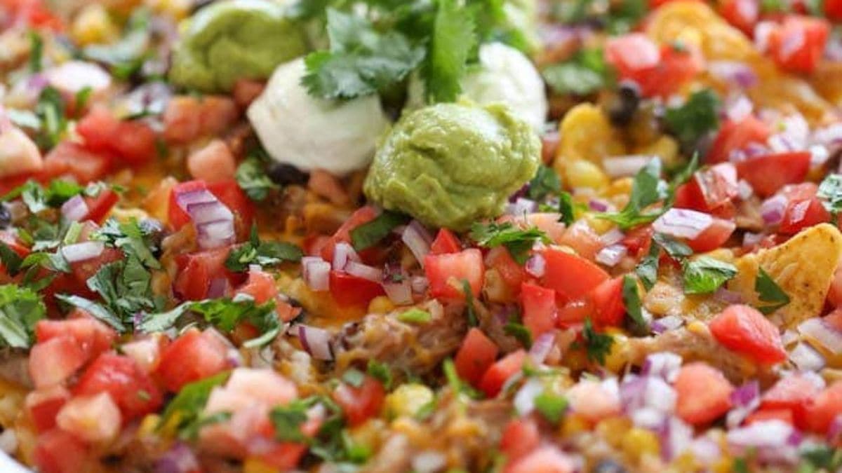 Loaded Pulled Pork Nachos Recipe. Photo credit Lauren's Latest.