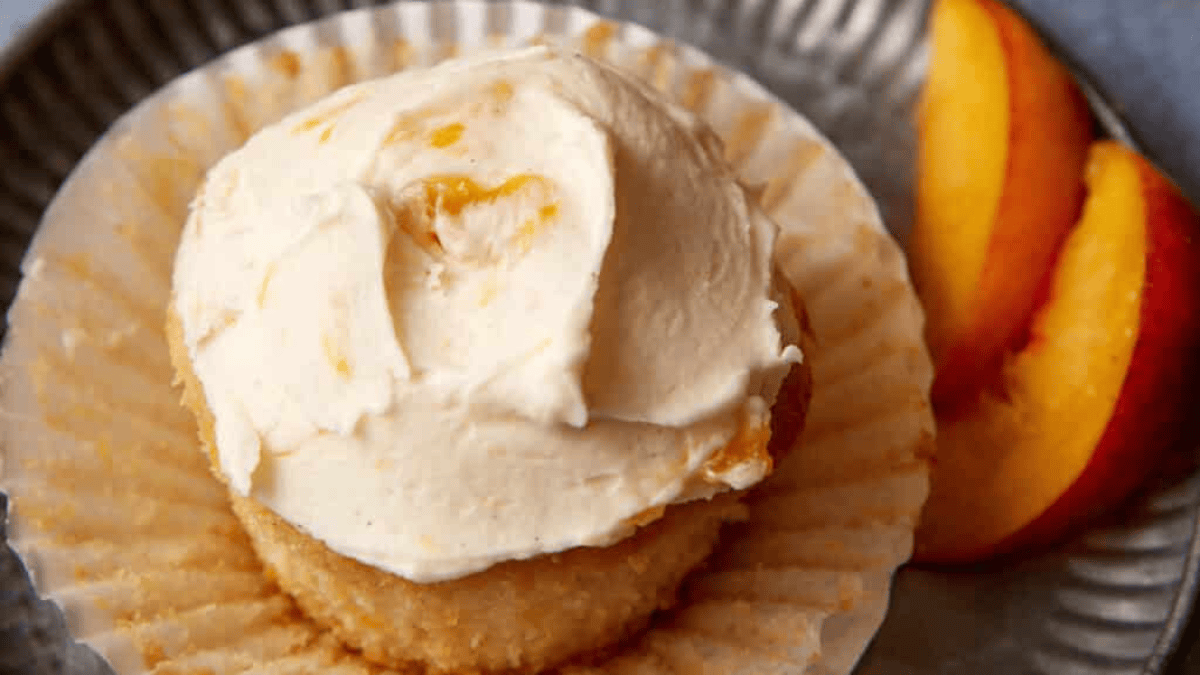 Moist Peach Cupcakes With Peach Buttercream Frosting. Photo credit Butter & Baggage